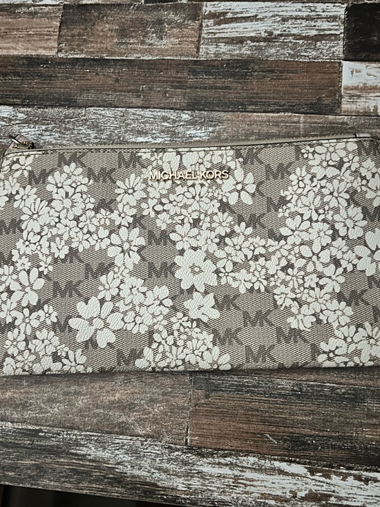 Michael Kors Handbags - NWOT Michael Kors Beige Floral Wristlet Clutch with Gold Logow